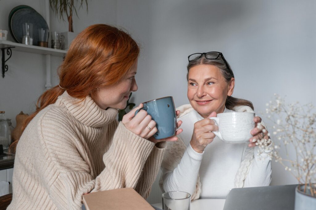 Two women drinking tea and the amazing health benefits of tea