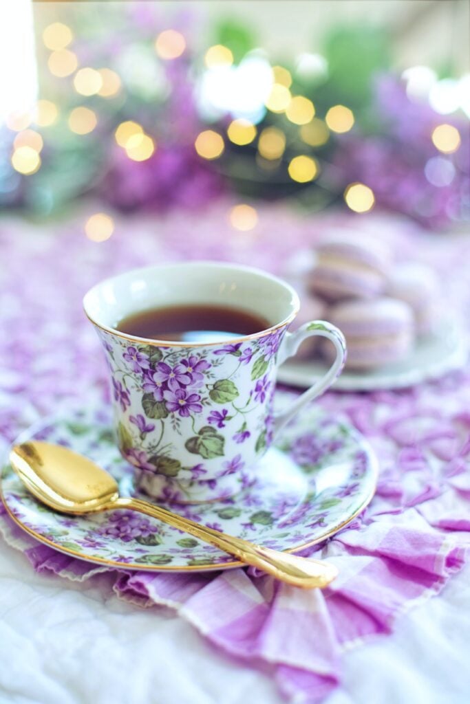 Purple flower tea cup and saucer with gold spoon