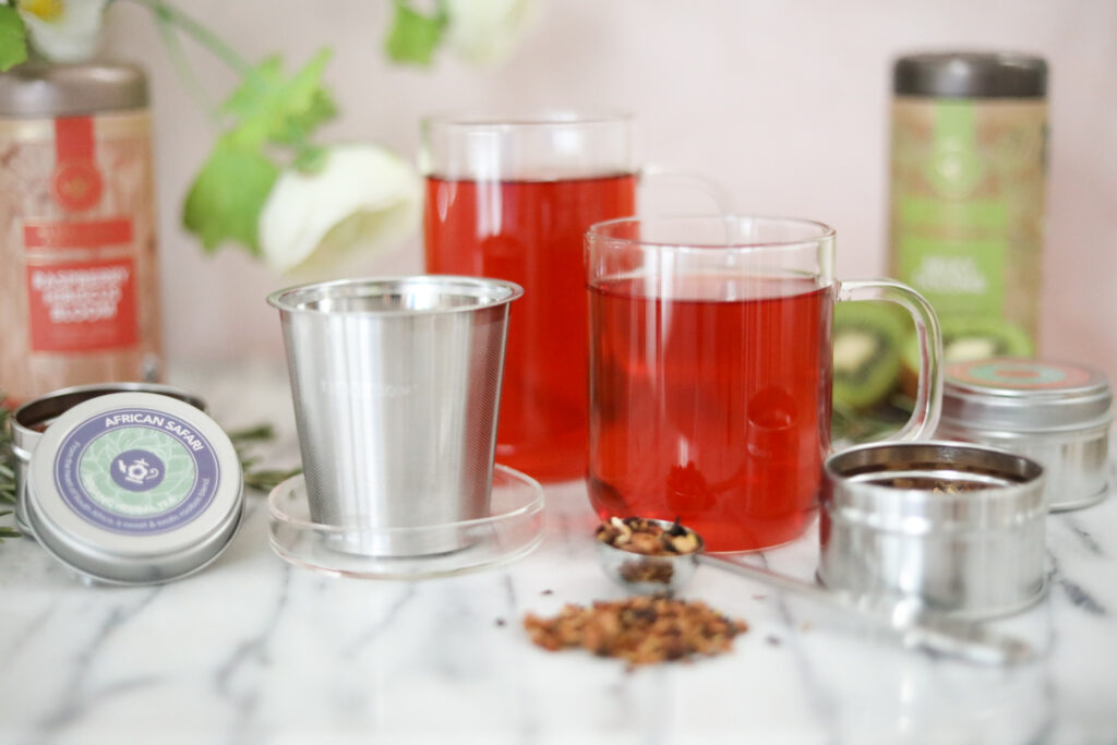 Teabloom tea mugs with tea and stainless steel infuser