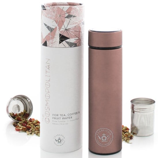 A rose gold tea tumbler with a removable infuser and gift-ready packaging.