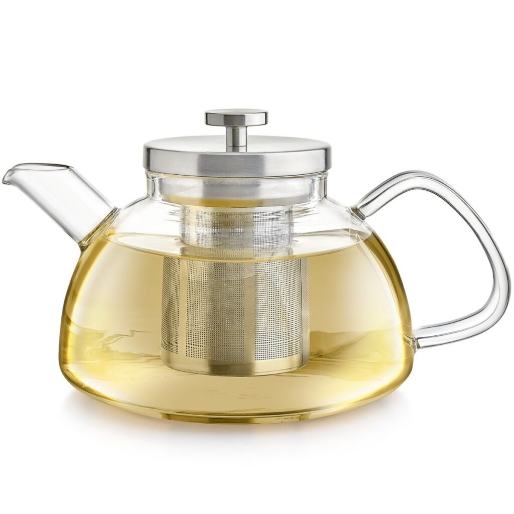 A tea kettle and teapot in one made from glass and stainless steel with a flat bottom.