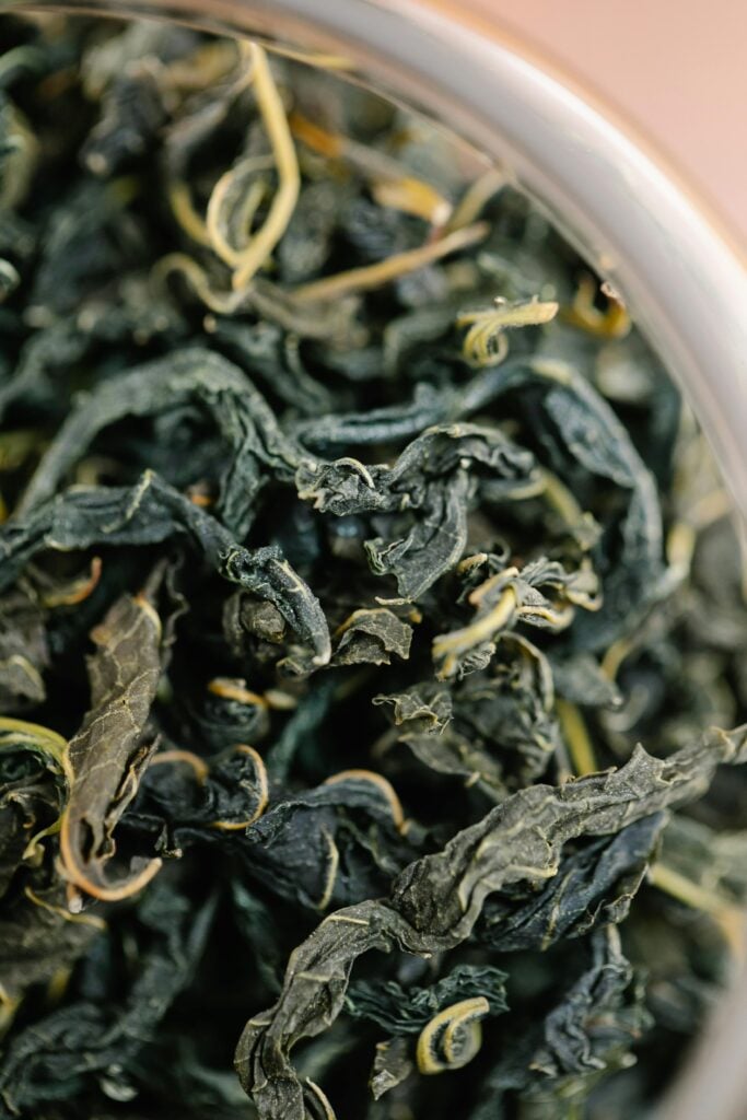 A close-up of oolong tea leaves as one of the best teas for energy.